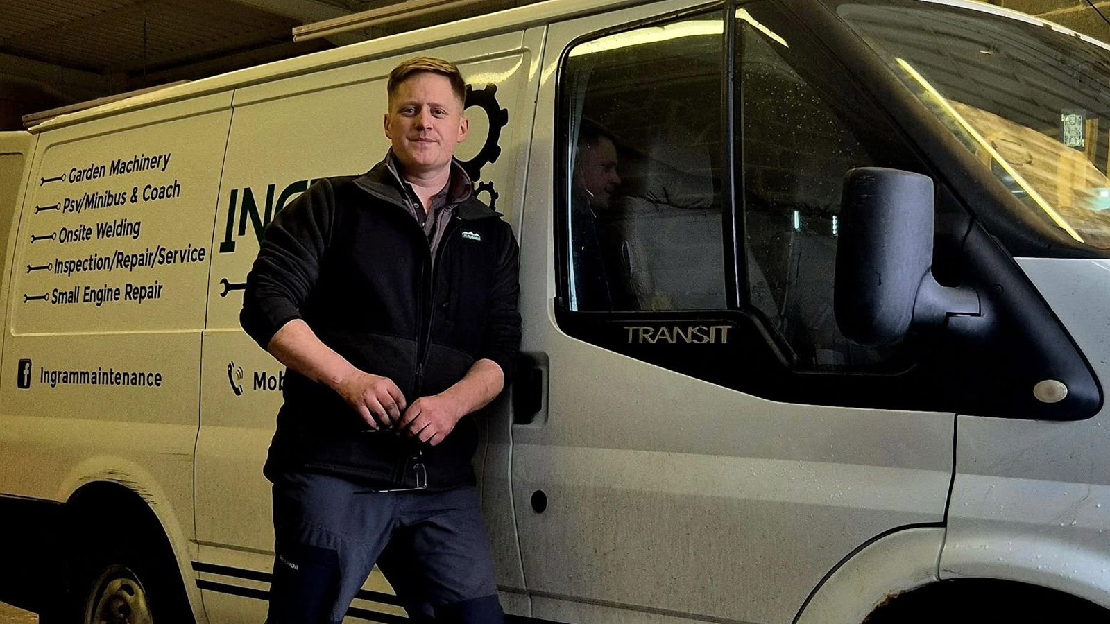 Ben Ingram beside the Ingram Maintenance Transit