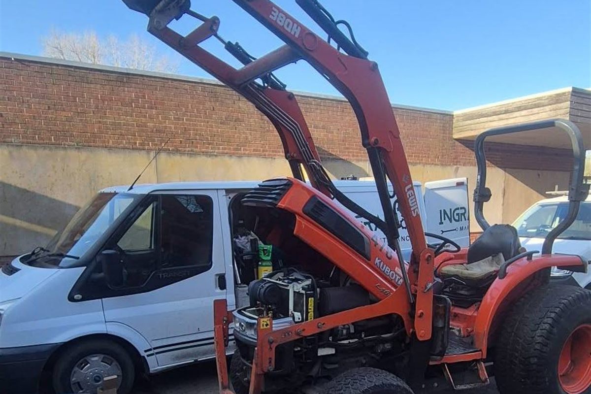 A Kubota compact tractor fitted with a Lewis 380H front loader
