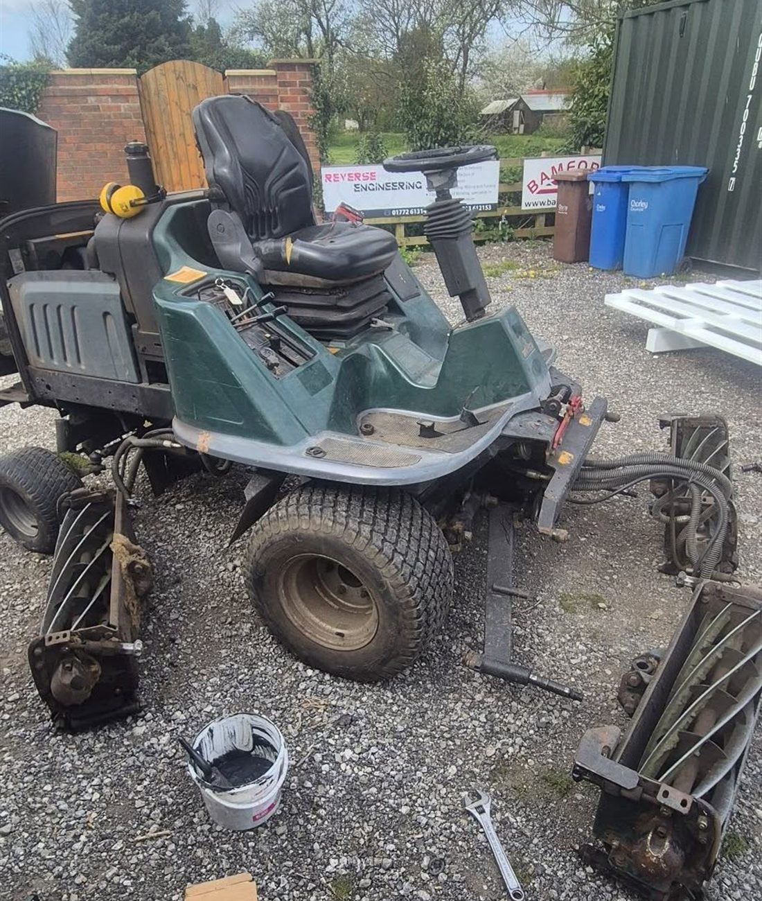 A Hayter LT324 cylinder mower stripped down for an engine service and backlap